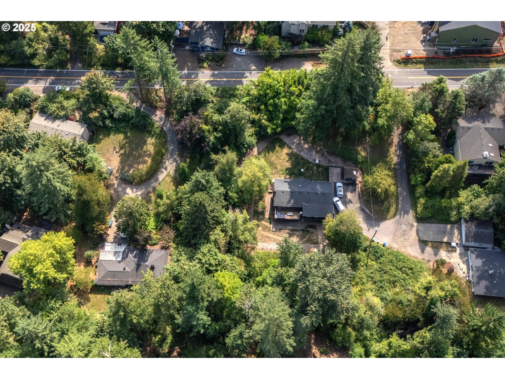 Southwest 43rd Avenue Portland, OR 97219 - Photo 5 of 24 a view of a house with a park