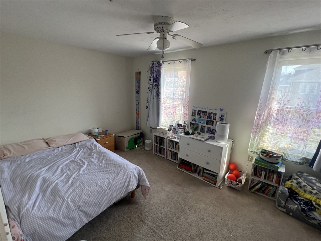 33 Lenglen Road, Unit 33 Newton, MA 02458 - Photo 8 of 9 a bed room with a bed and a window