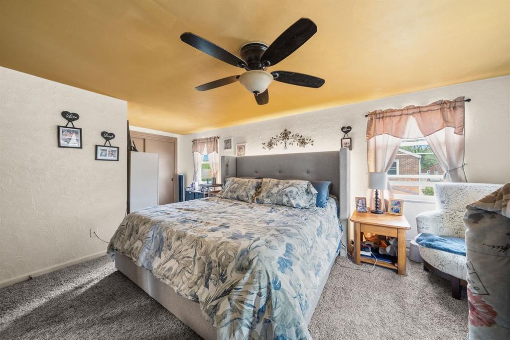 4768 Rolling Hills Road Pittsburgh, PA 15236 - Photo 23 of 46 a bedroom with a bed and a window