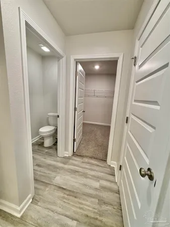 a spacious bathroom with a double vanity sink mirror and shower
