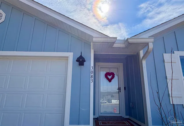 a house view with a backyard