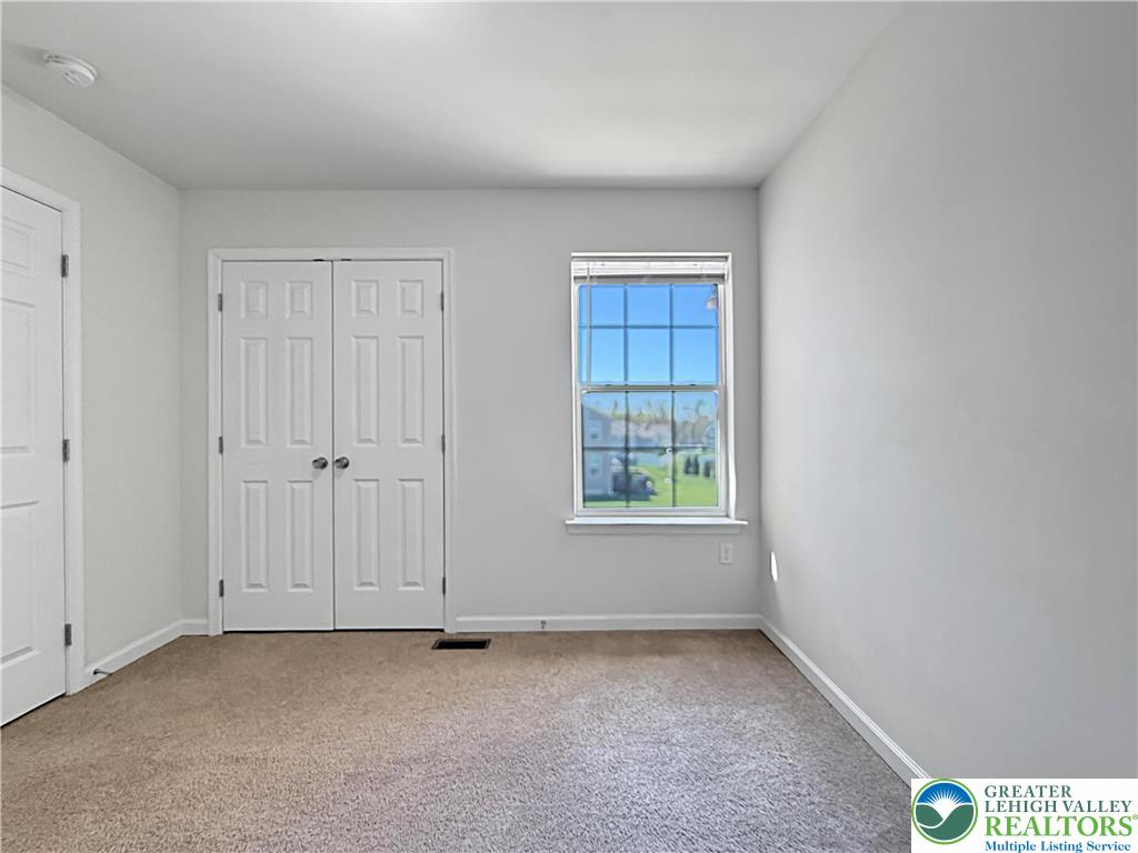 5335 Jutland Road Allentown, PA 18104 - Photo 7 of 13 an empty room with windows
