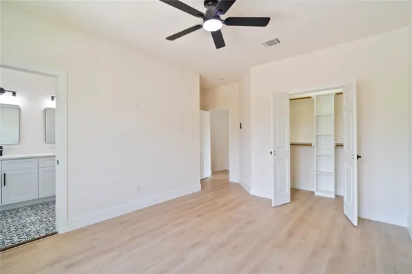 a view of front of a house with a fence