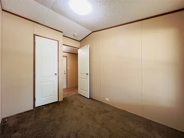 an empty room with closet
