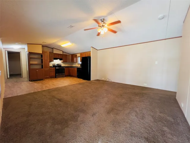 a view of a livingroom with a furniture