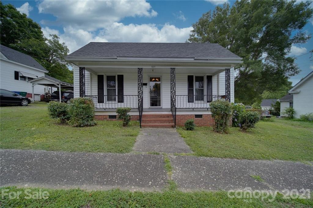 621 Graham Street Albemarle, NC 28001 - Photo 1 of 24 a front view of a house with garden