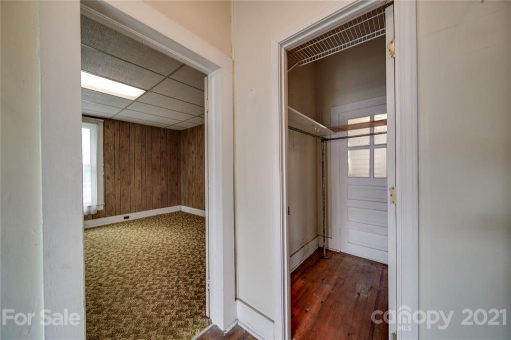 621 Graham Street Albemarle, NC 28001 - Photo 12 of 24 a view of hallway with wooden floor