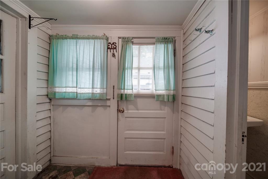 621 Graham Street Albemarle, NC 28001 - Photo 17 of 24 a bathroom with a shower and a window
