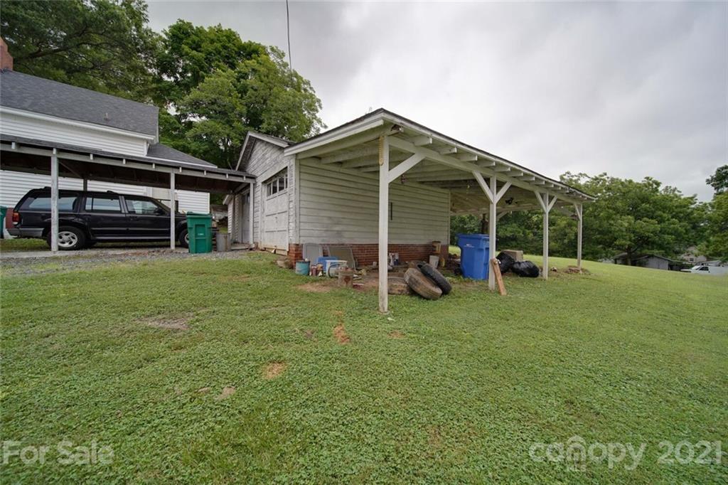 621 Graham Street Albemarle, NC 28001 - Photo 19 of 24 a view of a house with backyard and sitting area