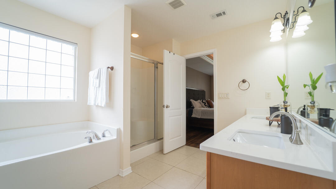 103 6th Avenue Shalimar, FL 32579 - Photo 12 of 23 a bathroom with a bathtub sink and mirror