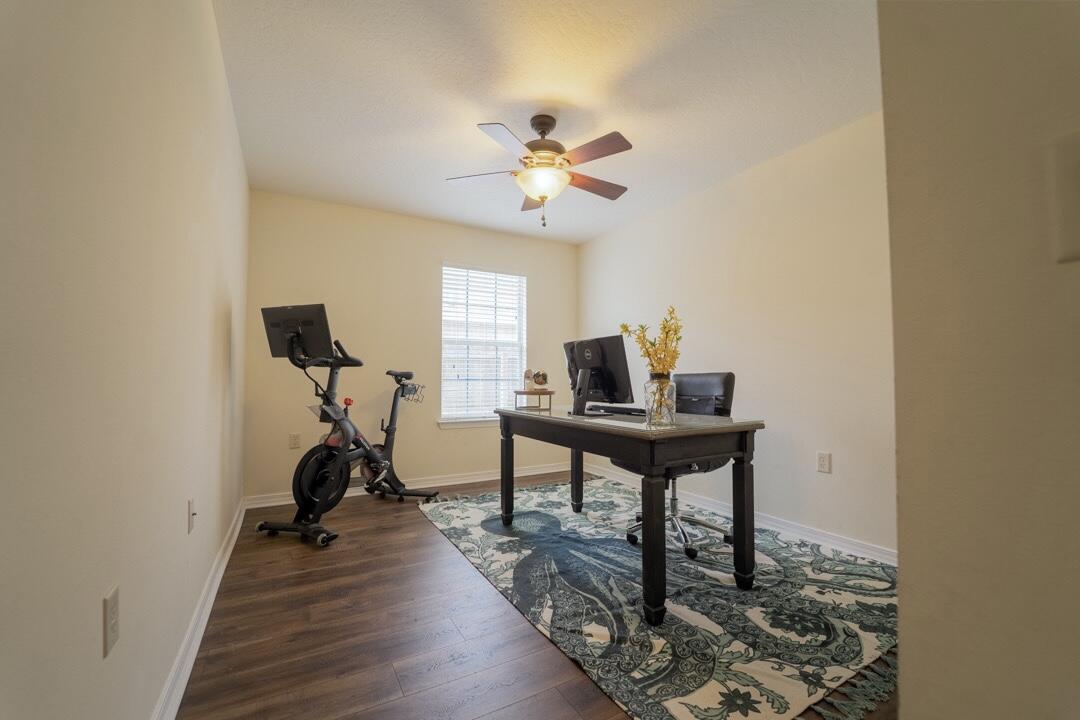 103 6th Avenue Shalimar, FL 32579 - Photo 18 of 23 a view of a workspace with furniture and a window