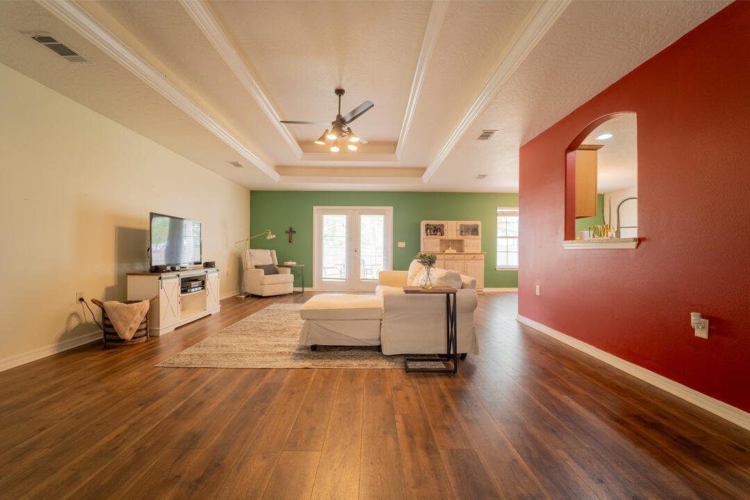 103 6th Avenue Shalimar, FL 32579 - Photo 2 of 23 a living room with furniture and a wooden floor