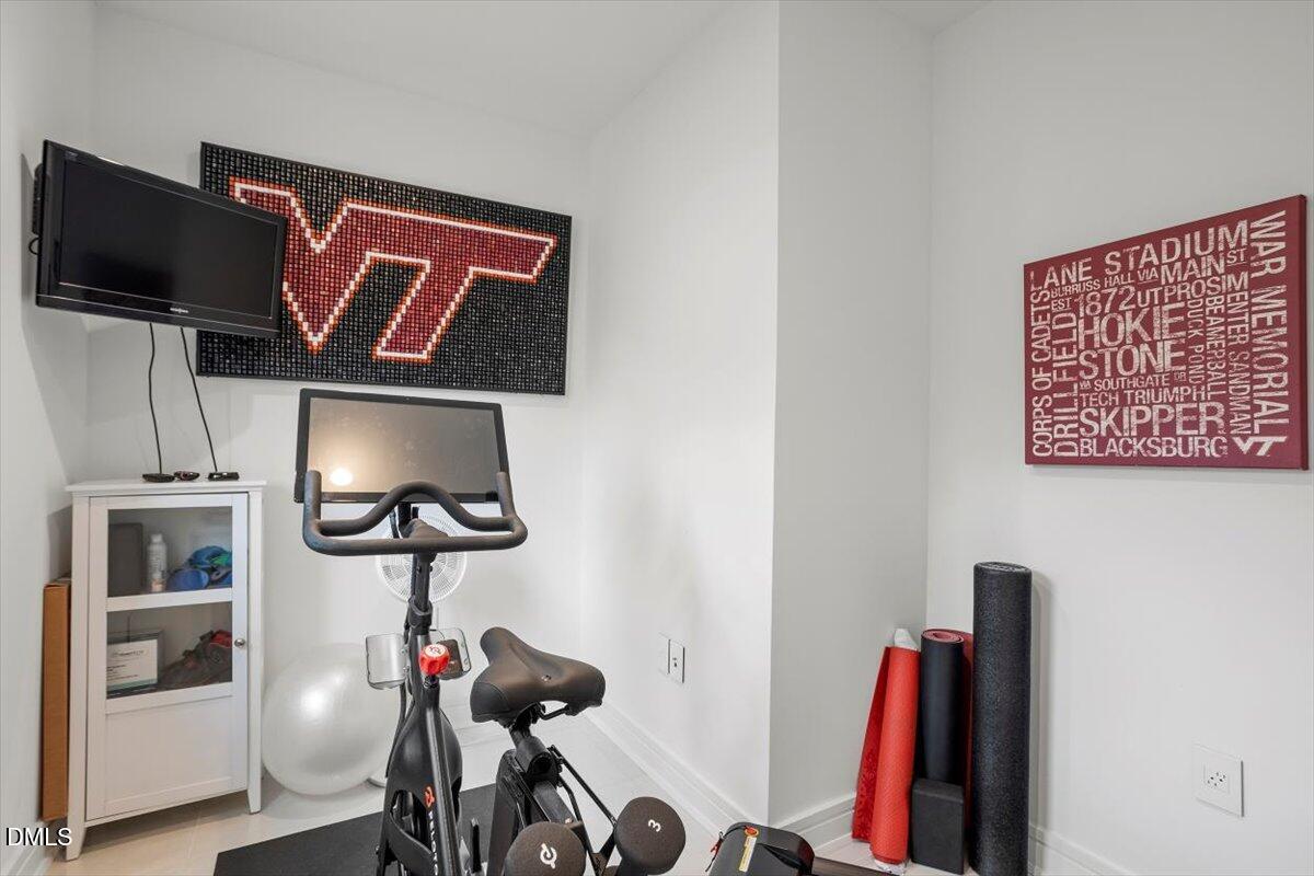 206 Dundas Lane Raleigh, NC 27603 - Photo 12 of 30 a view of a room with gym equipment