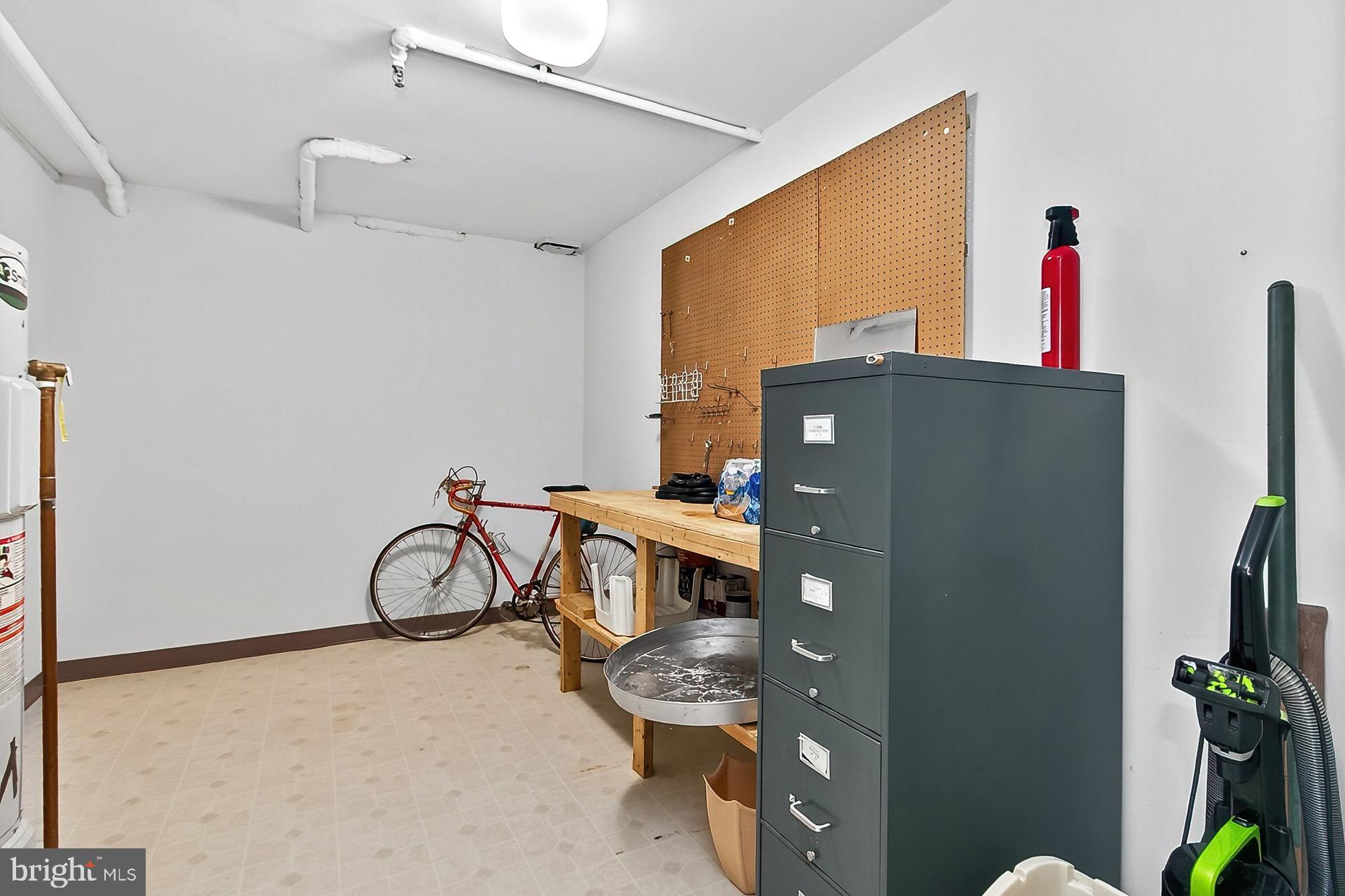 5920 Cove Landing Road, Unit 102 Burke, VA 22015 - Photo 20 of 45 a view of a livingroom with furniture and a window