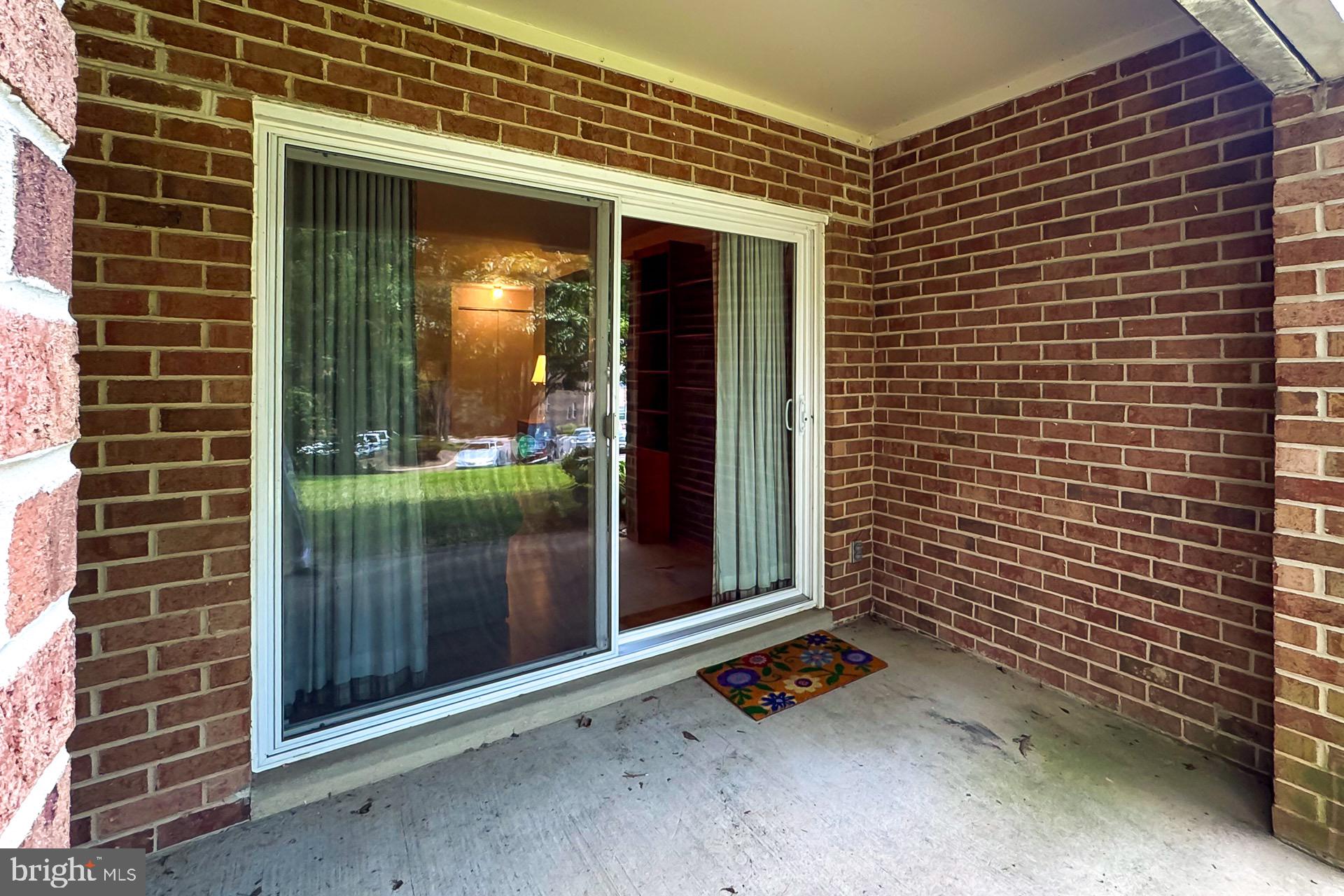 5920 Cove Landing Road, Unit 102 Burke, VA 22015 - Photo 22 of 45 a view of outdoor space with front door