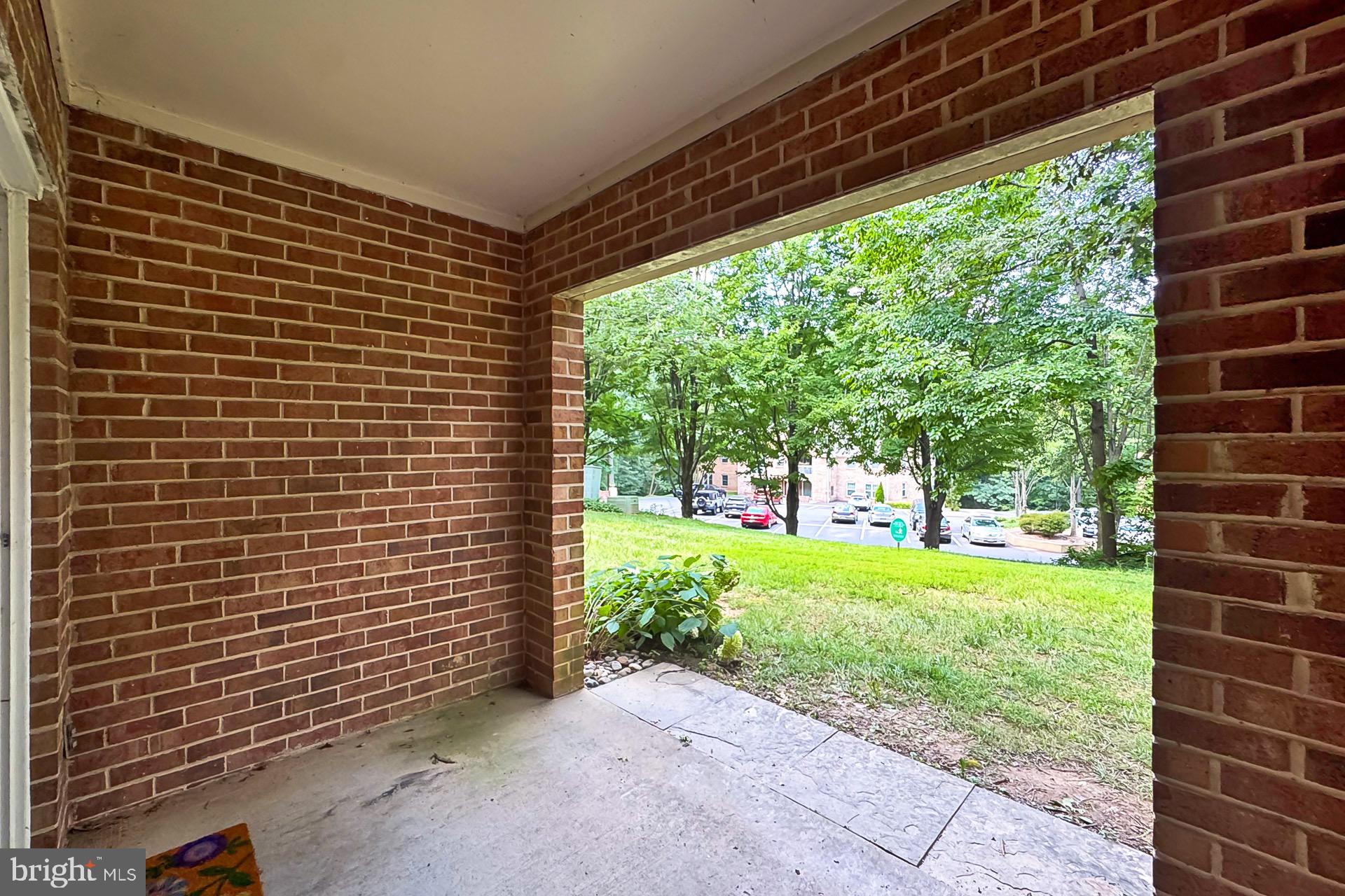 5920 Cove Landing Road, Unit 102 Burke, VA 22015 - Photo 23 of 45 a view of a back yard from a room