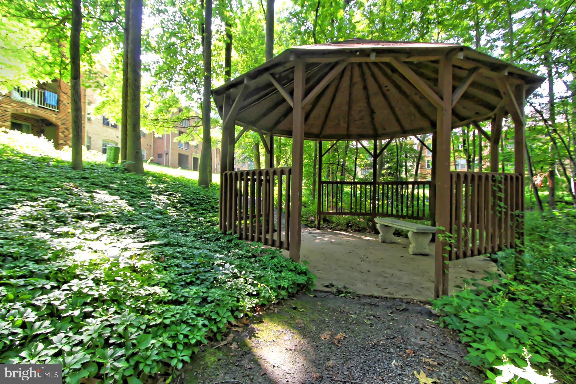 5920 Cove Landing Road, Unit 102 Burke, VA 22015 - Photo 30 of 45 a view of outdoor space yard and patio