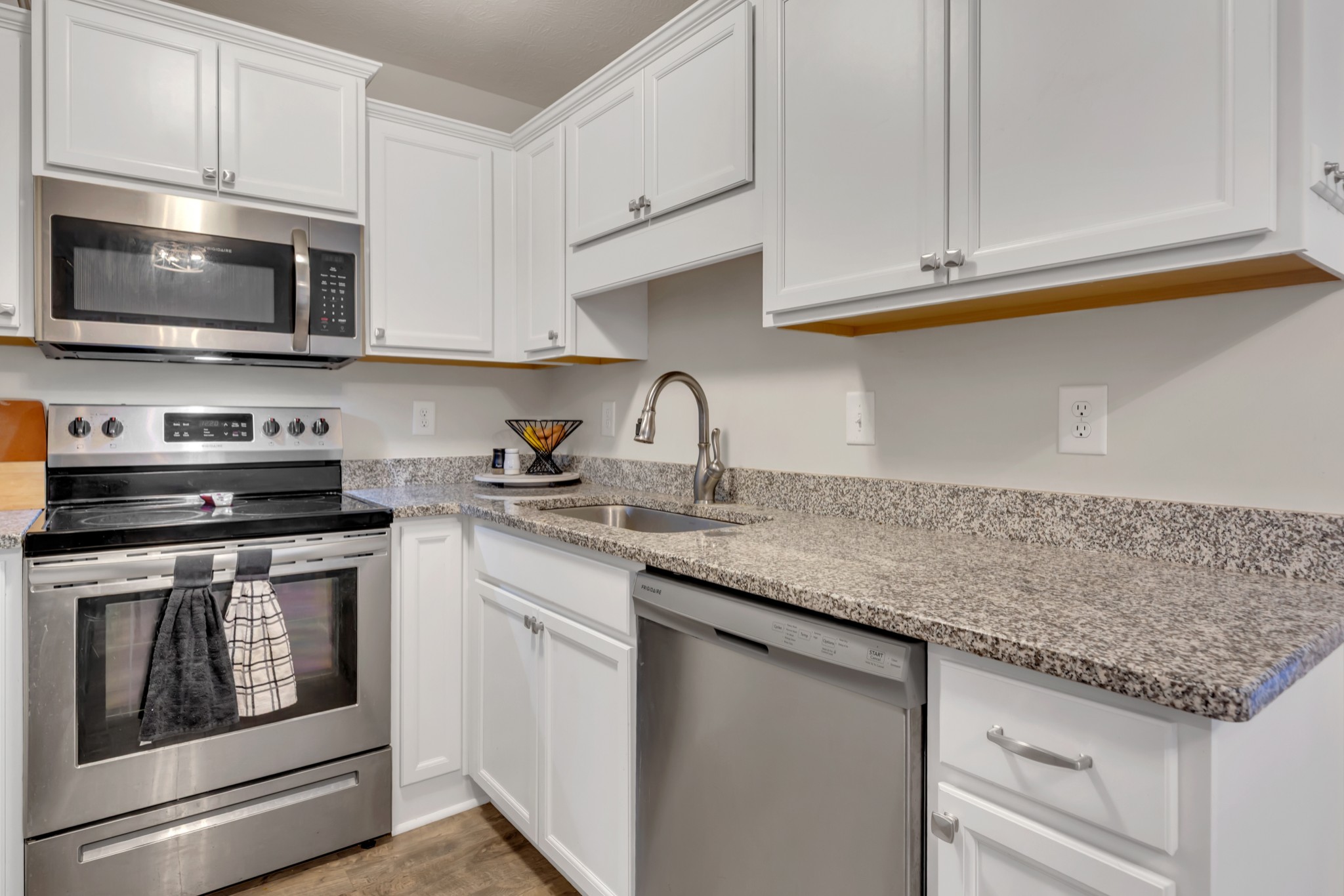 3507 Learning Lane Murfreesboro, TN 37128 - Photo 11 of 30 a kitchen with stainless steel appliances granite countertop a sink stove and microwave
