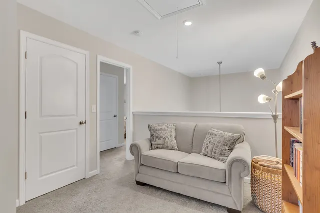 a living room with furniture and a couch