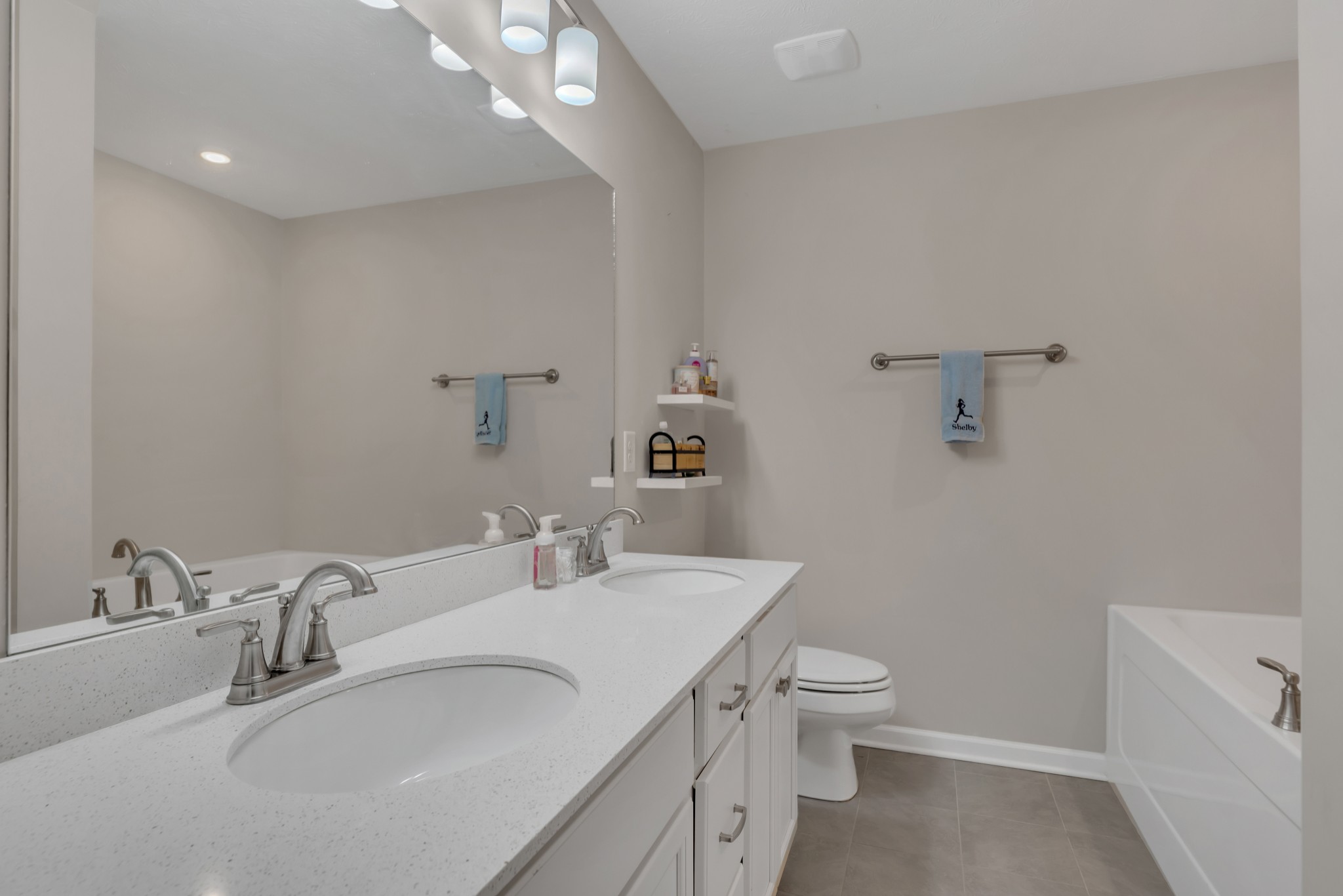 3507 Learning Lane Murfreesboro, TN 37128 - Photo 24 of 30 a bathroom with a sink a toilet and a mirror
