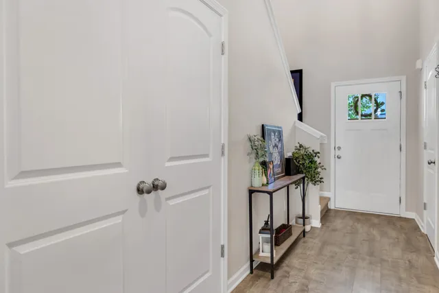 a view of entryway with wooden floor