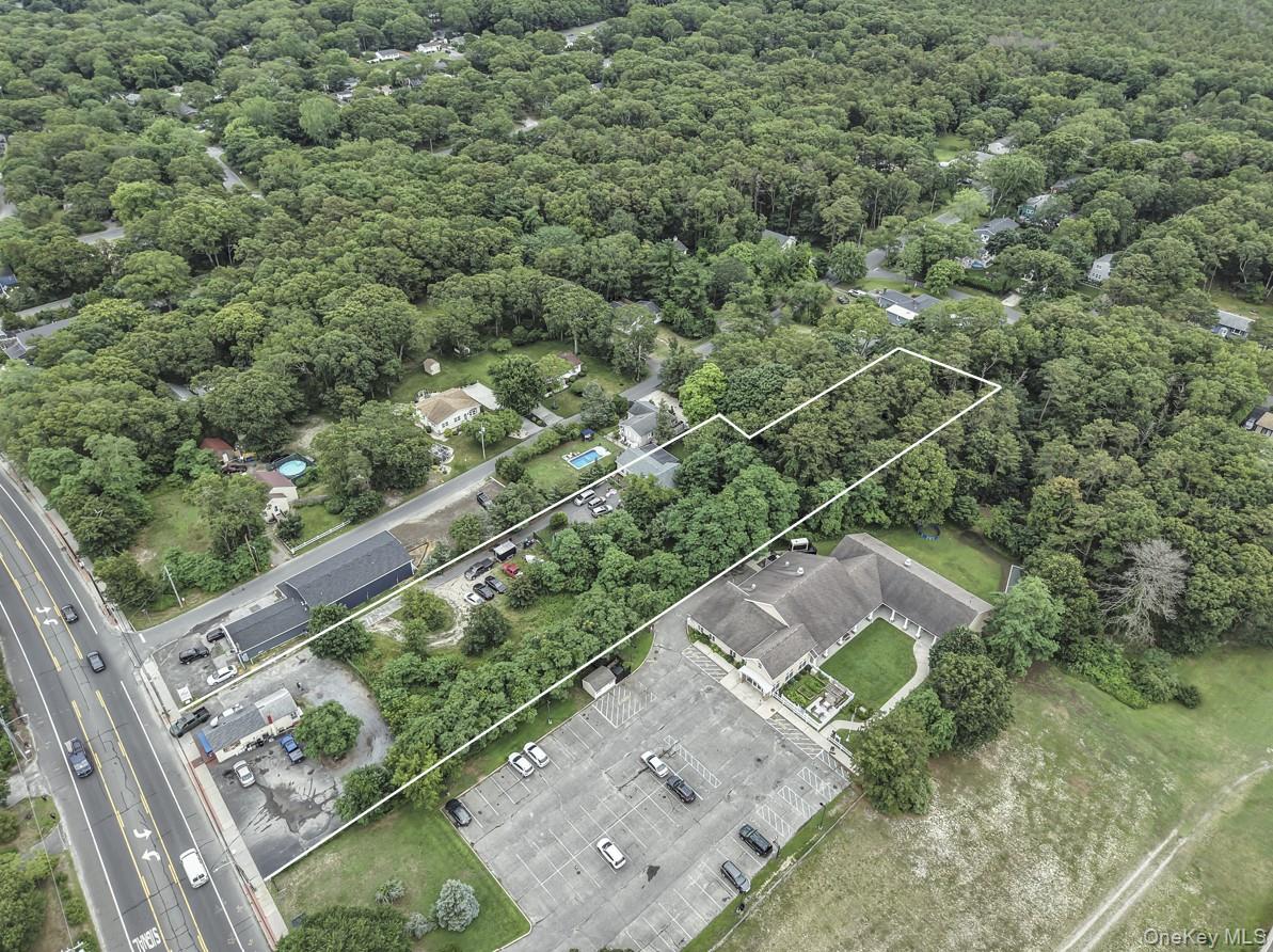 669 Flanders Road Flanders, NY 11901 - Photo 11 of 15 an aerial view of a house with a yard