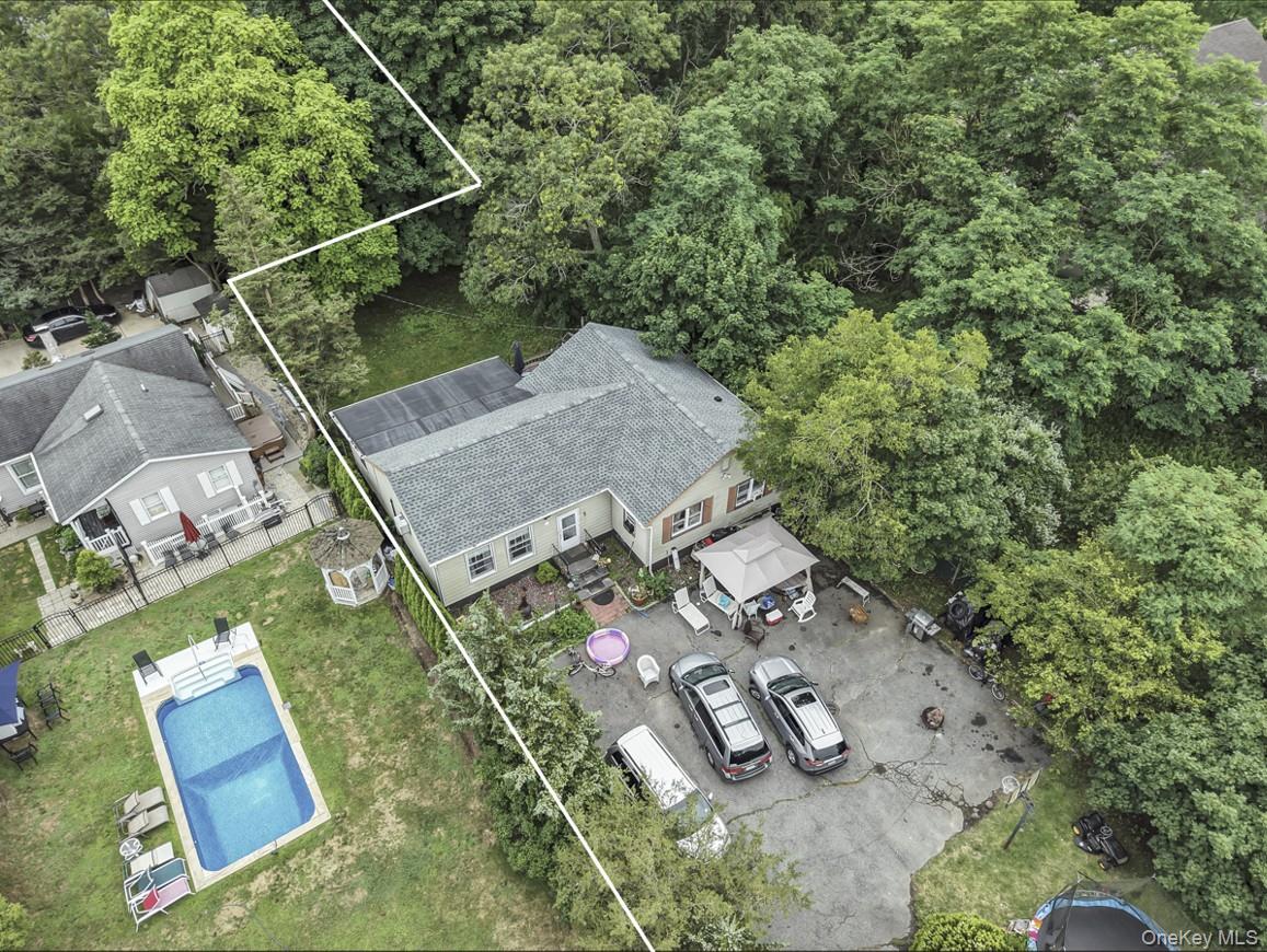 669 Flanders Road Flanders, NY 11901 - Photo 11 of 16 an aerial view of a house with a yard