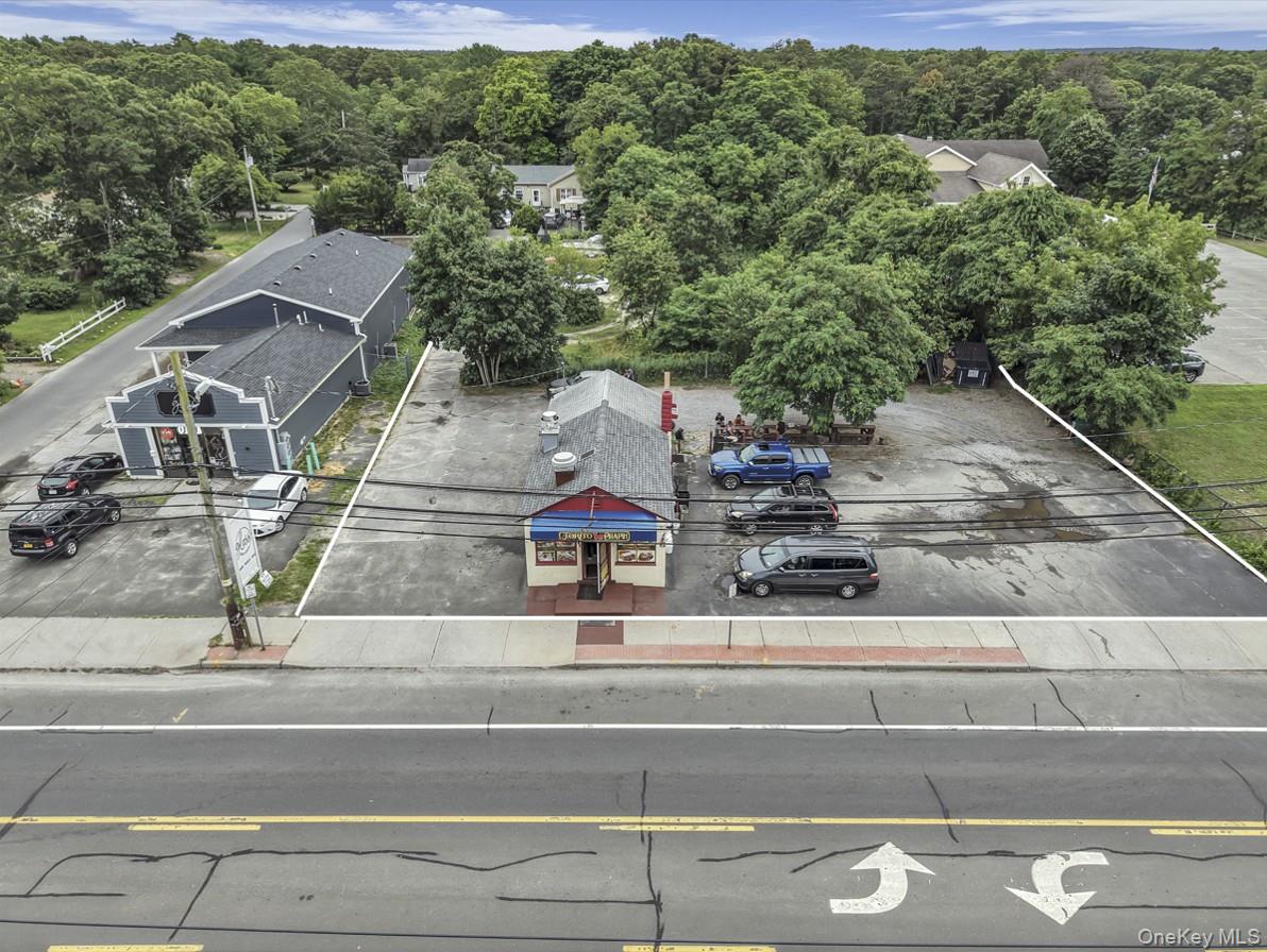 669 Flanders Road Flanders, NY 11901 - Photo 6 of 15 a view of a house with a outdoor space