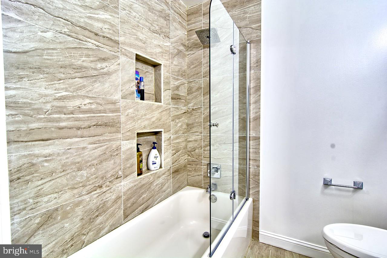 3403 Birch Hollow Road Baltimore, MD 21208 - Photo 26 of 39 Hall Bath with Porcelain Tile