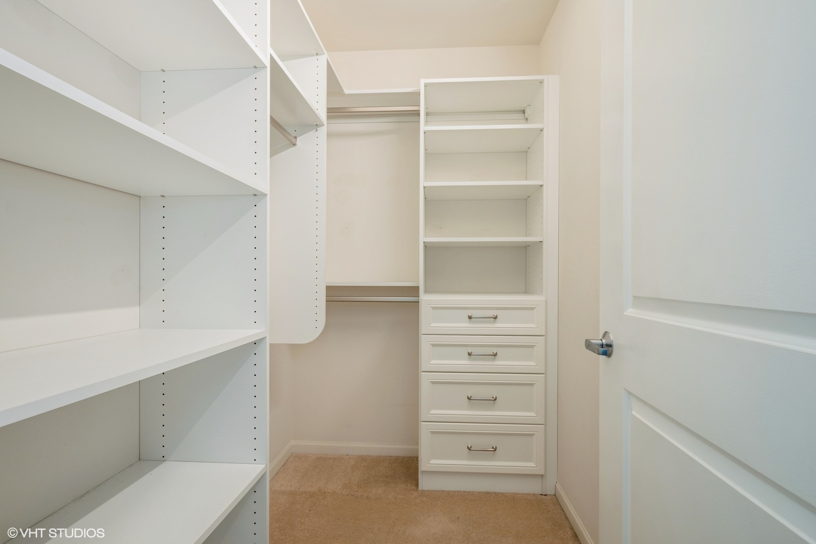 1199 East Port Clinton Road, Unit 610 Vernon Hills, IL 60061 - Photo 12 of 16 a view of walk in closet with empty racks