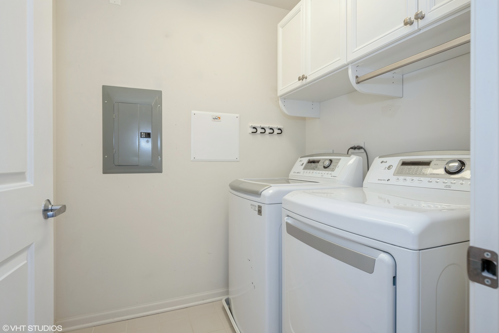 1199 East Port Clinton Road, Unit 610 Vernon Hills, IL 60061 - Photo 14 of 16 a utility room with dryer and washer