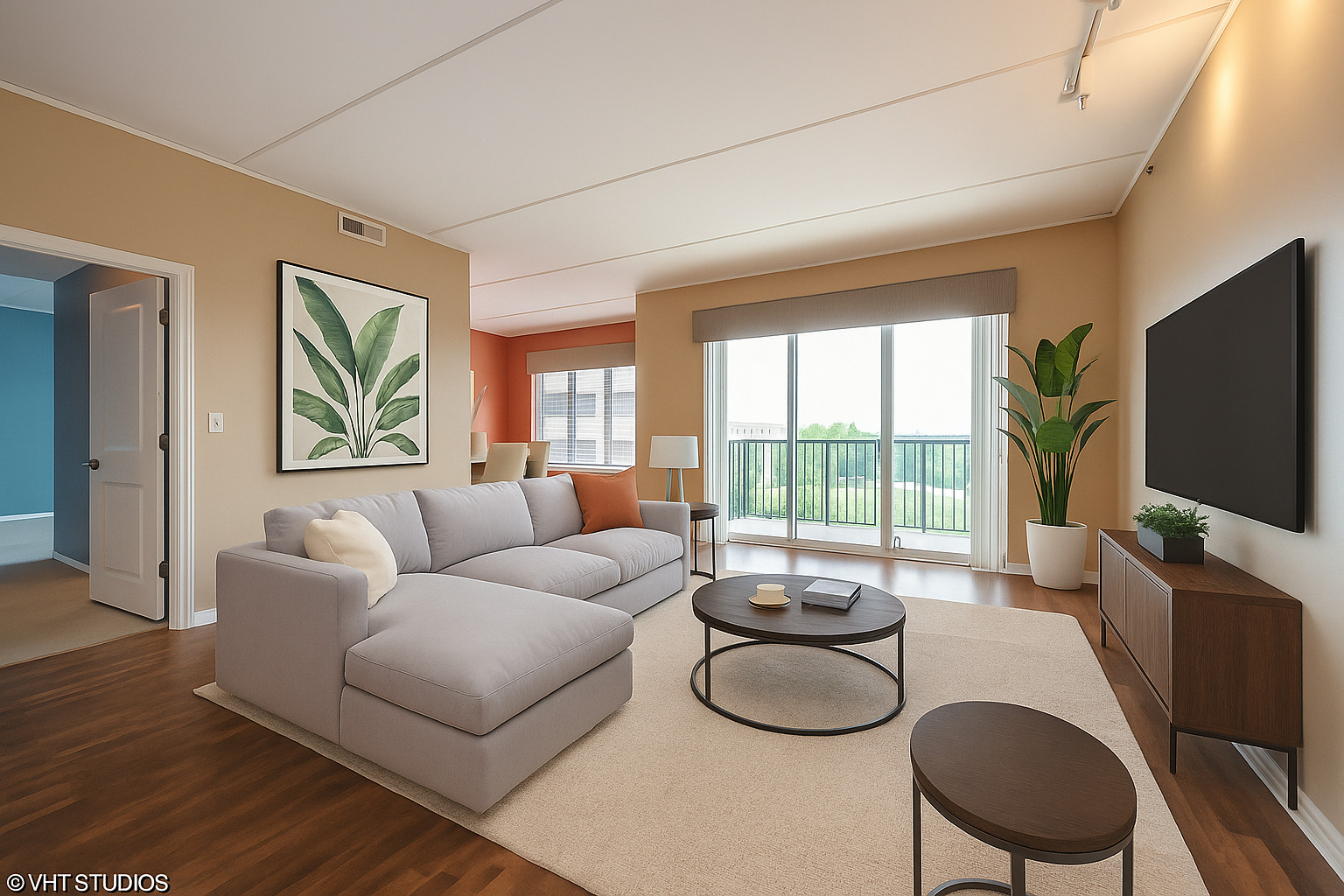 1199 East Port Clinton Road, Unit 610 Vernon Hills, IL 60061 - Photo 4 of 16 a living room with furniture a flat screen tv and a large window