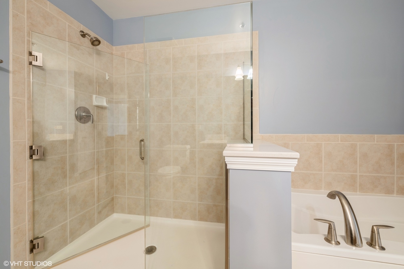 1199 East Port Clinton Road, Unit 610 Vernon Hills, IL 60061 - Photo 9 of 16 a bathroom with a shower and a sink