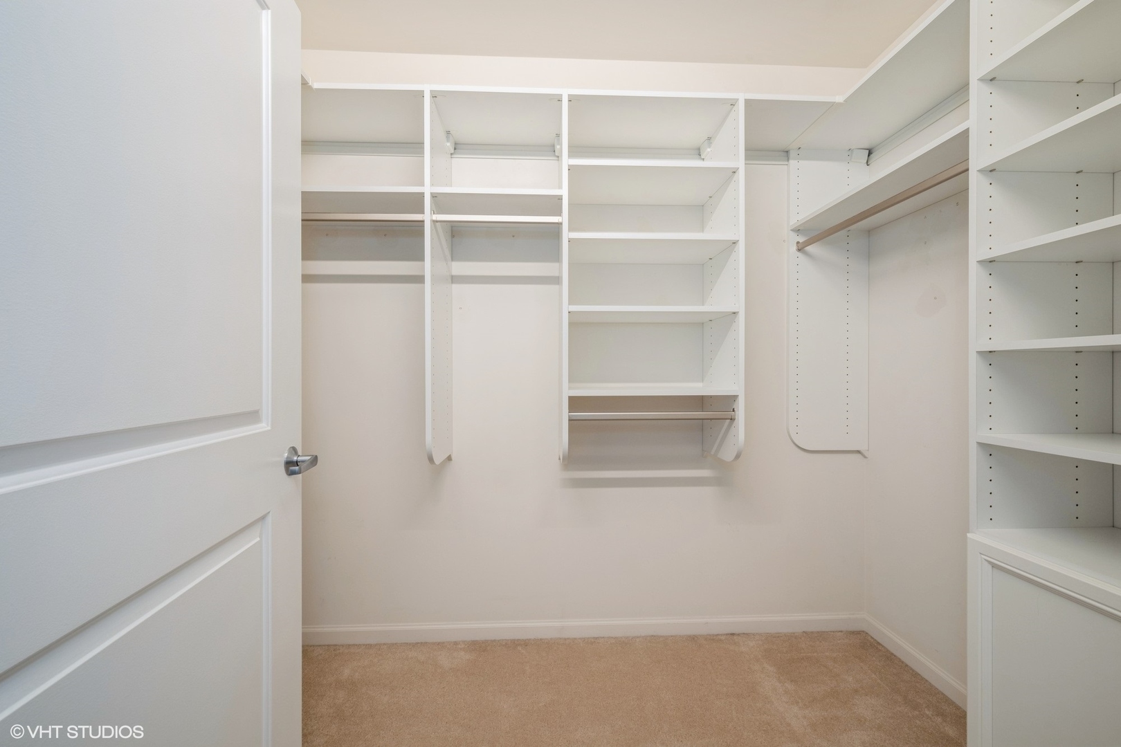 1199 East Port Clinton Road, Unit 610 Vernon Hills, IL 60061 - Photo 10 of 16 a view of walk in closet with empty racks