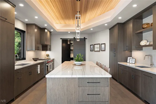 a utility room with sink dryer and washer