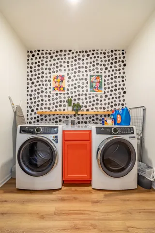 a bedroom with a bed and a desk in it