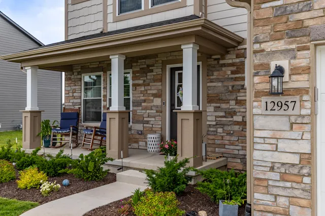 a front view of a house with a porch