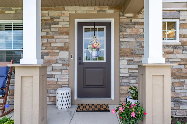 a work room with furniture and a bookshelf