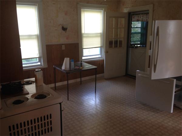 7 Ekman Street Worcester, MA 01607 - Photo 6 of 11 a view of a workspace with furniture and a window
