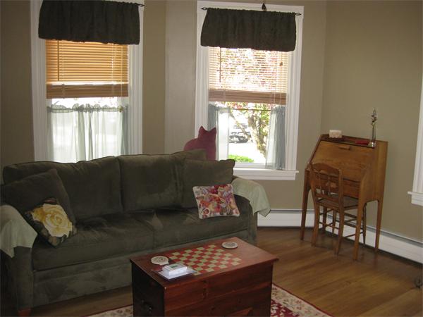 7 Ekman Street Worcester, MA 01607 - Photo 9 of 11 a living room with furniture and a window