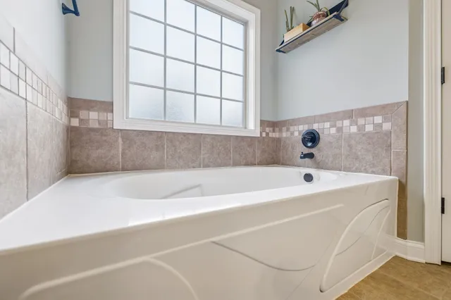 a view of a chairs on the roof deck