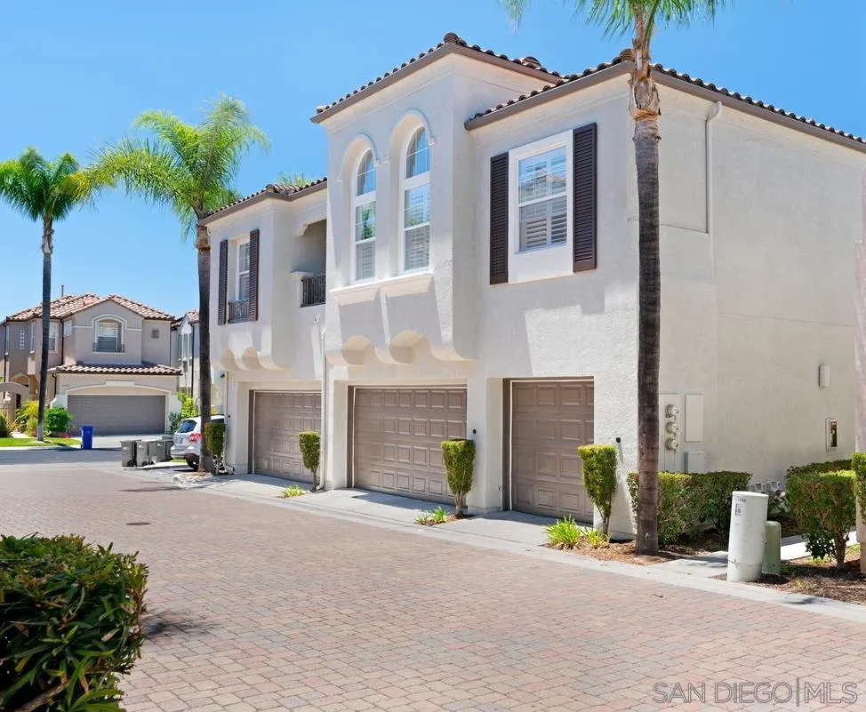 11456 Miro Circle San Diego, CA 92131 - Photo 1 of 34 a view of a street with a building in front of it