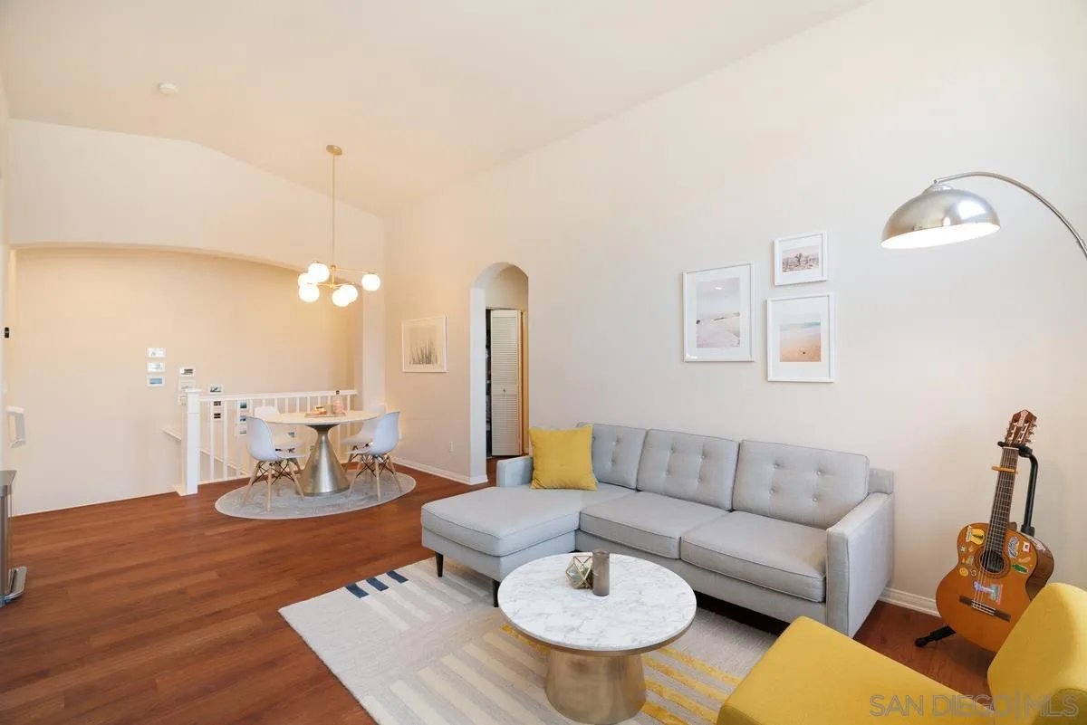 11456 Miro Circle San Diego, CA 92131 - Photo 11 of 34 a living room with furniture and a wooden floor