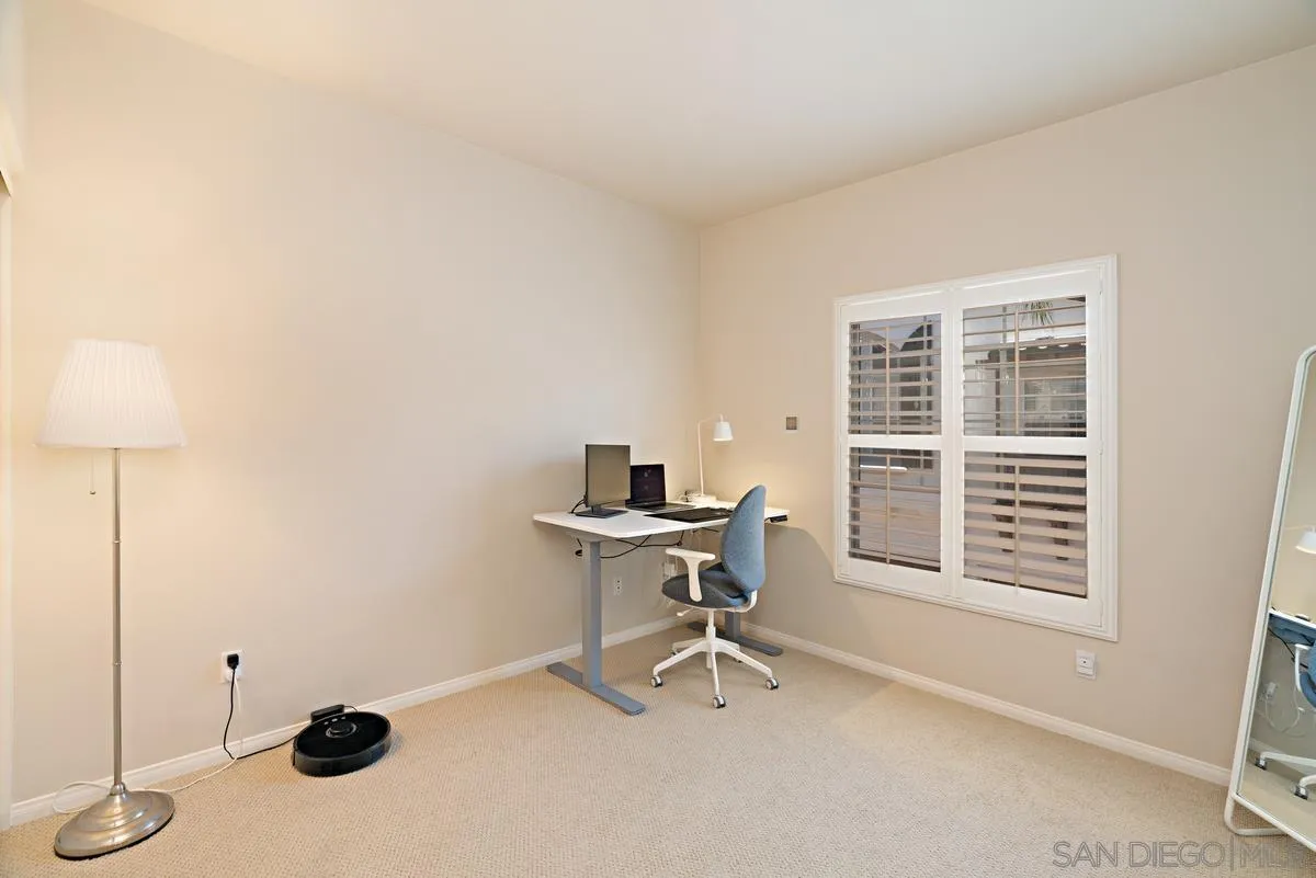 11456 Miro Circle San Diego, CA 92131 - Photo 24 of 34 a view of a workspace with furniture and a window