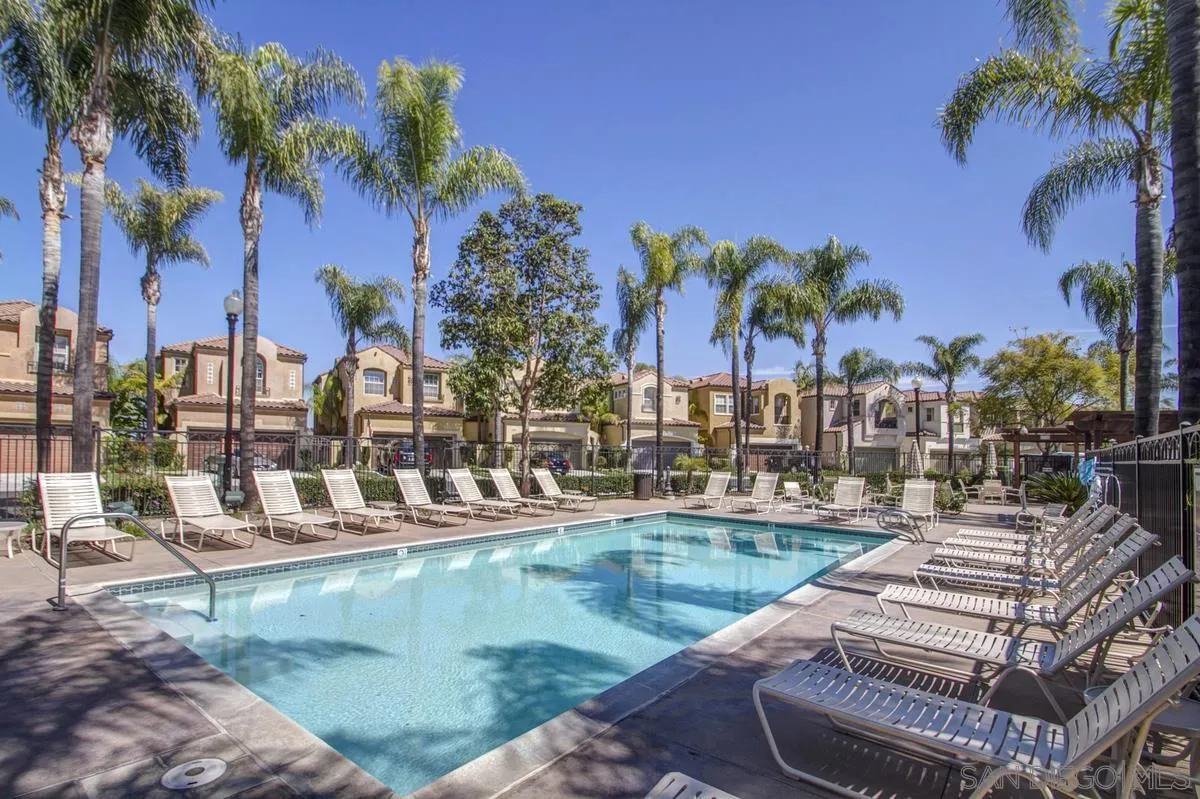 11456 Miro Circle San Diego, CA 92131 - Photo 34 of 34 a view of a swimming pool with a table and chairs