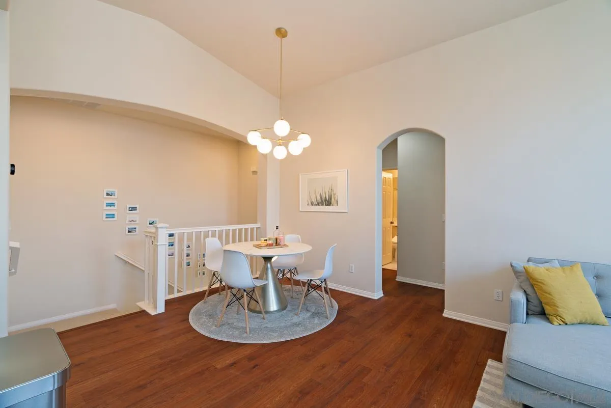 11456 Miro Circle San Diego, CA 92131 - Photo 7 of 34 a living room with furniture and a chandelier