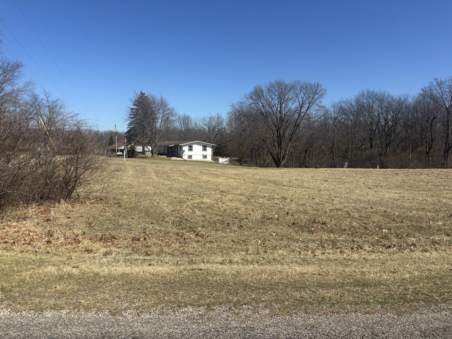 1043 Hidden Valley Drive Varna, IL 61375 - Photo 1 of 9 a street view with beach