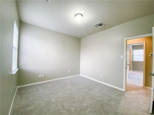 an empty room with an entryway