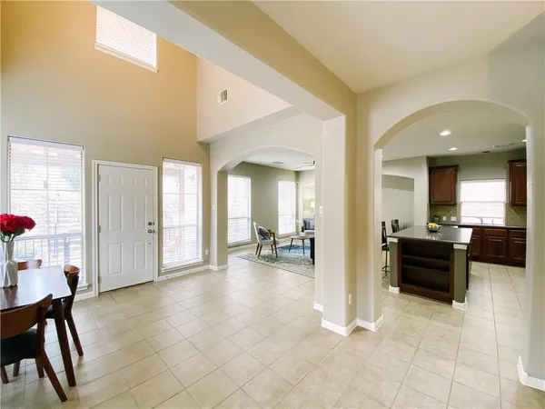 a view of a livingroom with furniture and windows