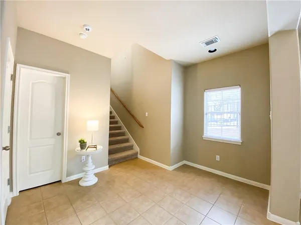 a view of an entryway with staircase